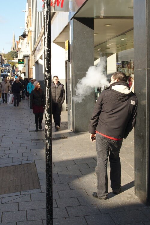 street photography man vaping